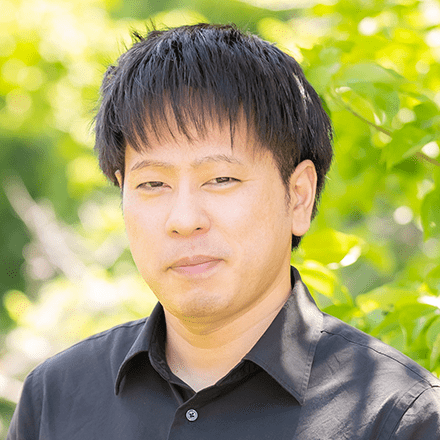 川名助教の顔写真